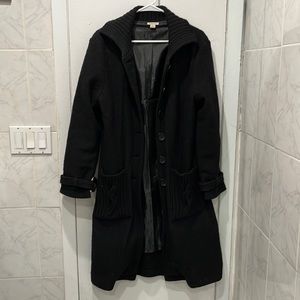 Long black coat with knit detailing